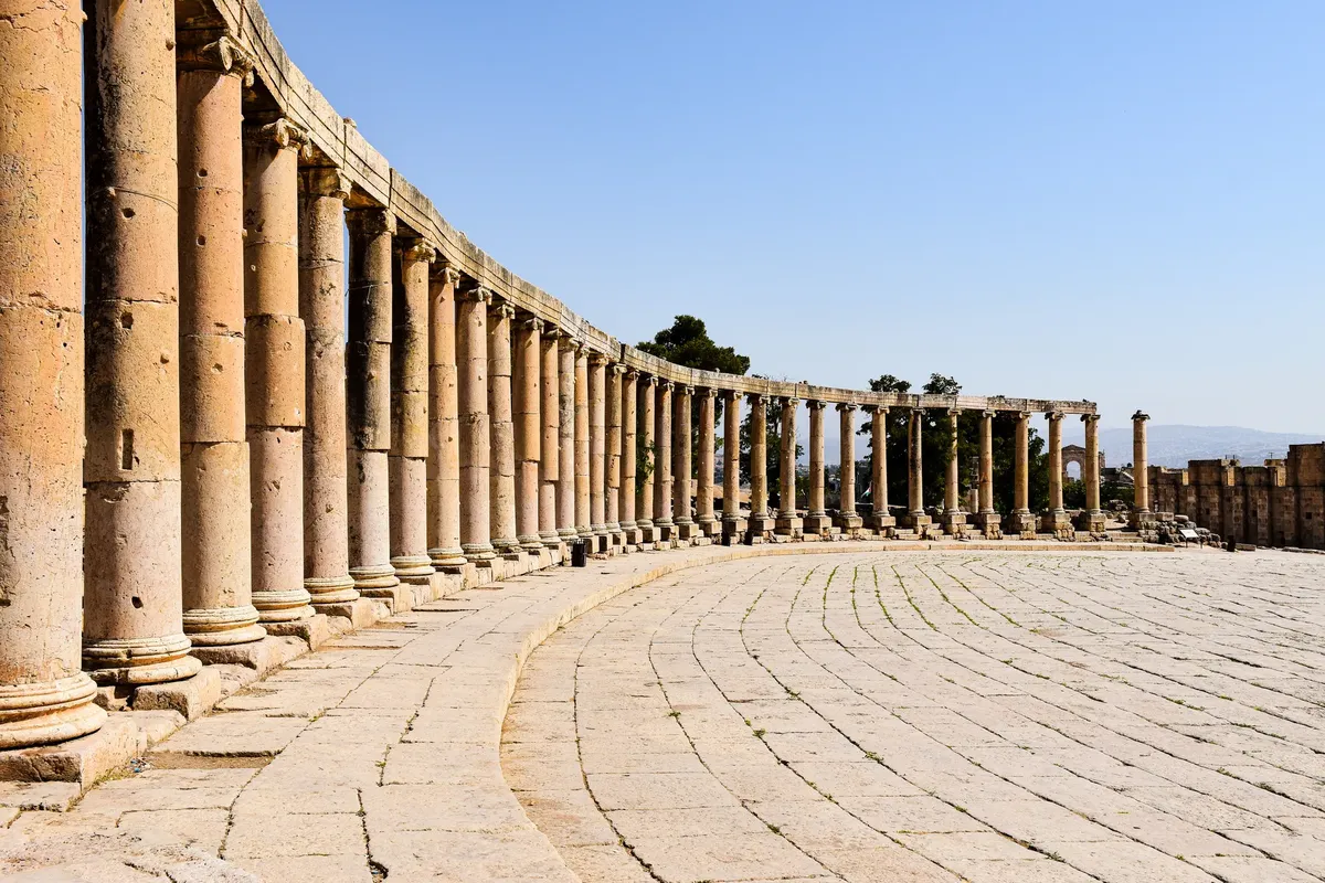Explore the ancient Roman architecture of Jerash, Jordan, showcasing well-preserved columns and the iconic Oval Plaza.
